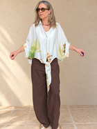 Blusa amarra flor verde