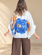 Blusa amarra flor azul